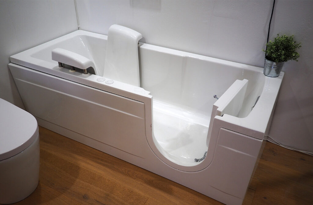 As we age, maintaining mobility can become increasingly challenging, making it essential to have a home environment that supports ease of movement and safety. Maintaining a house and making necessary building modifications are crucial for seniors wishing to age in place. For elderly homeowners, ensuring that their living space is accessible and secure is not just a matter of comfort. It’s an essential component of their health and well-being. In Newport, RI, Home Mobility Pros stands out as a trusted provider specializing in senior home renovations. We help renovate properties to blend style with accessibility and safety, ensuring that every renovation supports both function and visual appeal. We are committed to transforming homes into safer, more accessible spaces personalized to the unique needs of seniors. Seniors in Rhode Island can access various resources for financial assistance to help them maintain and improve their homes. Needs of Elderly Homeowners Challenges Faced by Seniors Elderly homeowners often face various mobility challenges that can make everyday tasks difficult and even dangerous. These challenges include: Navigating Stairs: Climbing stairs can be strenuous and risky for seniors, especially those with joint issues or balance problems. Installing handrails and stair lifts can greatly enhance safety and ease of movement. Bathroom Safety: Bathrooms are a common site for falls due to slippery surfaces and hard-to-reach fixtures. Adding grab bars, non-slip mats, and accessible shower chairs can significantly reduce the risk of accidents. Wheelchair Accessibility: Homes not designed for wheelchair use can severely limit the mobility and independence of those who rely on them. Building modifications, such as widening doorways and constructing ramps, are essential to comply with building codes and safety standards, and to improve mobility for seniors and persons with disabilities. Ensuring accessible countertops can also make a home much more livable. Many assistance programs for seniors and persons with disabilities have specific eligibility requirements related to age, income, and homeownership. Importance of a Safe and Accessible Home Environment A safe and accessible home environment is paramount for the elderly for several reasons. First and foremost, a secure home reduces the risk of accidents and injuries, which can have significant health implications for seniors. Falls and other mishaps can lead to prolonged recovery times, increased medical expenses, and a loss of independence. Secondly, an accessible home promotes autonomy, allowing elderly individuals to carry out daily activities without constant assistance. This independence is crucial for their mental and emotional well-being, as it fosters a sense of dignity and self-reliance. Additionally, a well-adapted home can alleviate the physical strain on caregivers, making it easier for family members and healthcare providers to offer support. Property improvements not only enhance safety and accessibility but also increase the value and longevity of the home, making it a wise investment for seniors and their families. Many financial assistance programs are available to help with senior home renovations in Newport, often providing flexible payment options or deferred payments to make these upgrades more affordable. Overall, ensuring a safe and accessible living environment enhances the overall quality of life for elderly homeowners, providing them with the comfort and peace of mind they deserve. At Home Mobility Pros, we offer a comprehensive range of services designed to meet the specific needs of elderly homeowners. Some of our key services include: Bathroom Renovations Bathrooms are one of the most hazardous areas in a home for seniors. We provide: Walk-in Tubs and Showers: These easy-access bathing solutions are designed to eliminate the risk of stepping over high tub edges, making it safer for individuals with mobility issues to bathe independently and comfortably. Grab Bars and Handrails: Strategically placed support bars provide necessary stability and prevent slips. Installed near toilets, showers, and bathtubs, they offer added security and confidence. Non-Slip Flooring: Specially designed flooring options that reduce the likelihood of falls by providing better grip. Ideal for bathrooms, kitchens, and other high-risk areas, these floors enhance overall safety in the home. Stairlift Installations Stairs can pose a significant challenge for seniors. Our stairlift solutions include: Custom Stairlifts: Tailored to fit the specific dimensions of your staircase, whether straight or curved, ensuring a perfect fit for maximum comfort and safety. User-Friendly Controls: Simple, intuitive controls designed for ease of use, allowing users to operate the stairlift effortlessly and with confidence. Safety Features: Equipped with built-in safety mechanisms such as seat belts to secure the user, swivel seats for easy access, and obstruction sensors to prevent accidents and ensure smooth operation. Home Modifications for Wheelchair Accessibility Ensuring that homes are accessible to wheelchair users is a priority. Our modifications include: Widened Doorways: Enlarging door frames to accommodate wheelchairs, ensuring that individuals with mobility aids can move freely and comfortably throughout their home without obstruction. Ramp Installations: Installing ramps at entrances and other critical points in the home, providing easy and safe access for those who use wheelchairs, walkers, or have difficulty with stairs. Lowered Countertops and Cabinets: Modifying kitchen and bathroom spaces to be more accessible, allowing individuals to reach and use these areas easily, thereby promoting independence in daily living activities. Financing Options for Senior Home Renovations Rhode Island residents with disabilities can make their homes safer and more accessible with financial help from the RI Livable Home Modification Grant. This program provides up to $4,500 to reimburse 50% of costs for essential home modifications such as walk-in tubs, wheelchair ramps, grab bars, and widened doorways. To qualify, applicants must: Be Rhode Island residents Have a disability that limits mobility or daily activities Meet income requirements based on family size The process includes confirming eligibility, getting a professional assessment, submitting an application, and awaiting approval before starting any work. Once approved, modifications must comply with local building codes, and homeowners can hire licensed contractors of their choice. After work is completed, reimbursement is processed within 40-60 days. At Home Mobility Pros, we simplify the process by offering in-home consultations, professional installations, and guidance through the grant application. Let us help you create a safer, more comfortable home to support your independence and quality of life. Home Mobility Pros Process We pride ourselves on delivering personalized solutions with meticulous attention to detail. We work closely with our clients, ensuring a customer-centric approach and an outstanding experience throughout the renovation process. Our team excels in adaptive design, customizing each aspect of the renovation to suit the unique needs of every individual. Here’s how our process works: Initial Consultation Our process begins with a thorough consultation where we assess your home and discuss your specific needs and concerns. Customized Plan Based on the consultation, we develop a tailored plan that addresses your mobility challenges and enhances your home’s accessibility. Our customized plan is designed to blend style with functional necessity, ensuring both visual appeal and practical accessibility. Home Mobility Pros specializes in renovations that achieve this balance for seniors. Professional Installation Our team of skilled professionals carries out the renovations with precision, ensuring minimal disruption to your daily life. We make sure all modifications comply with building codes and include necessary structural changes, such as widening doorways or constructing ramps, to enhance safety and accessibility for seniors. Ongoing Support We don’t just complete the job and leave; we provide ongoing support and maintenance to ensure that your home remains safe and functional. We also help homeowners maintain their renovated homes, so safety, accessibility, and durability are preserved for the long term. Senior Home Renovations Near Newport Creating a safe, accessible home environment for seniors is not just a luxury—it's a necessity. If you or a loved one are struggling with mobility challenges at home, don't wait for an accident to happen. Contact Home Mobility Bathroom Renovations