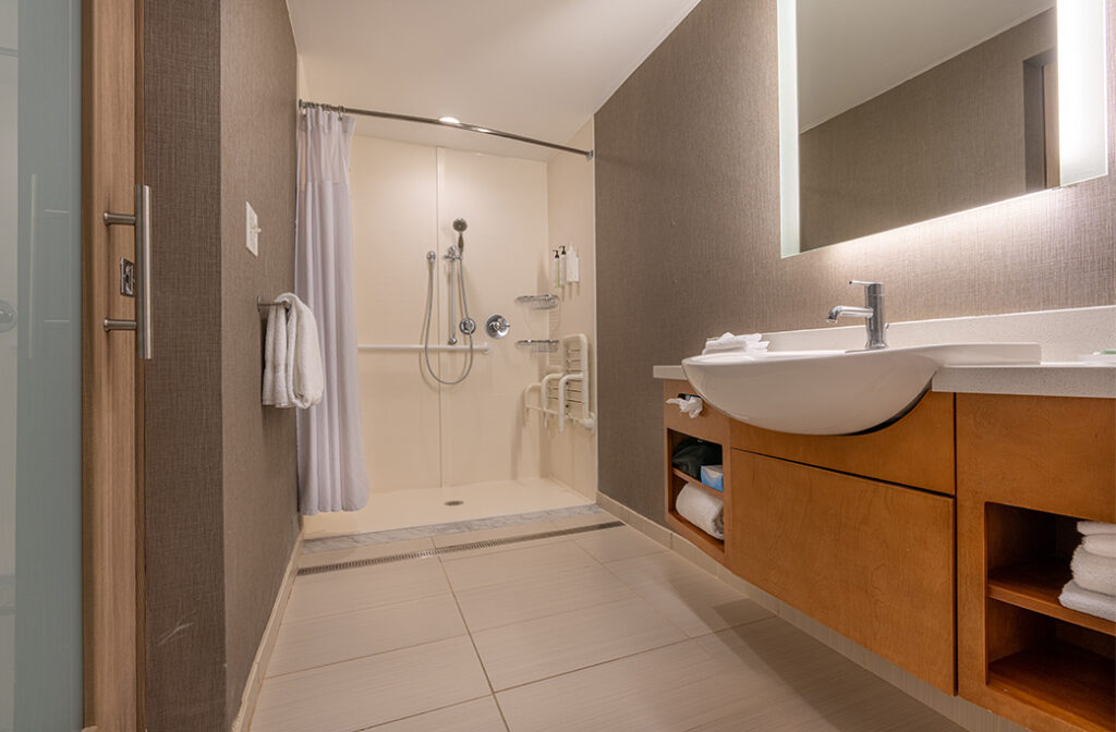 An accessible walk in shower designed for limited mobility.