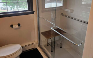 Accessible bathroom design with grab bars and shower seating for safe recovery after surgery